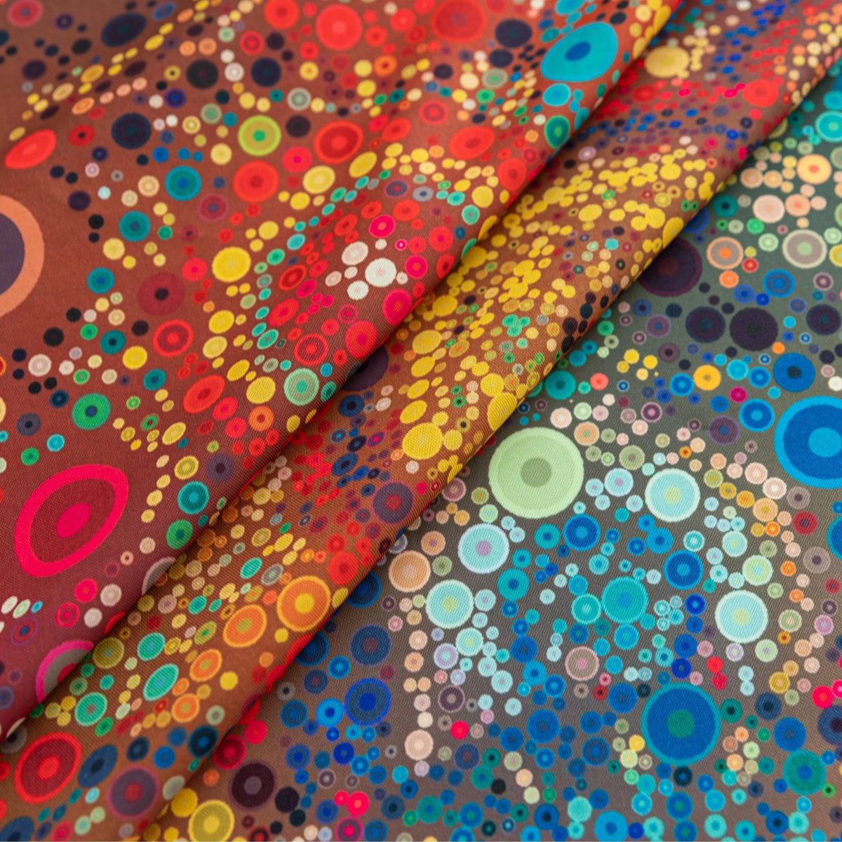 Colorful Bohemian Round Tablecloth ¨C Brighten your dining space with this vibrant round tablecloth featuring an eclectic mix of circular mandala-inspired patterns in bold red, yellow, turquoise, and blue hues. Accented with playful multicolor tassels, it adds a lively and artistic touch to any table setting. Perfect for kitchen tables, garden parties, picnics, or festive gatherings, this durable and eye-catching tablecloth is ideal for both everyday meals and special occasions.
