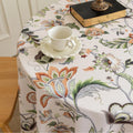 Vintage Floral Round Tablecloth – Brighten your dining space with this elegant round tablecloth featuring a soft cream background adorned with intricate multicolor floral patterns. Detailed with graceful vines and blooms in warm earthy tones, it’s finished with delicate white tassels for a charming touch. Perfect for kitchen tables, coffee corners, or garden parties, this durable and stylish tablecloth complements farmhouse, cottage, and classic décor styles.
