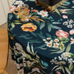 Elegant Dark Floral Round Tablecloth ¨C Add a touch of sophistication to your dining area with this round tablecloth featuring a rich dark green background adorned with vibrant floral prints in shades of orange, pink, and white. Finished with delicate white tassels, it combines elegance with charm, making it perfect for everyday meals, tea parties, or special gatherings. Durable and stylish, it complements both modern and classic home d¨¦cor.
