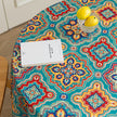Bohemian Round Tablecloth ¨C Add vibrant charm to your dining area with this colorful round tablecloth featuring intricate Moroccan-inspired patterns in bold turquoise, red, and yellow hues. Finished with playful multicolor tassels along the edge, it brings a lively boho flair to both indoor and outdoor dining. Perfect for kitchen tables, coffee nooks, or garden parties, this durable and eye-catching tablecloth is ideal for everyday use or special occasions.

