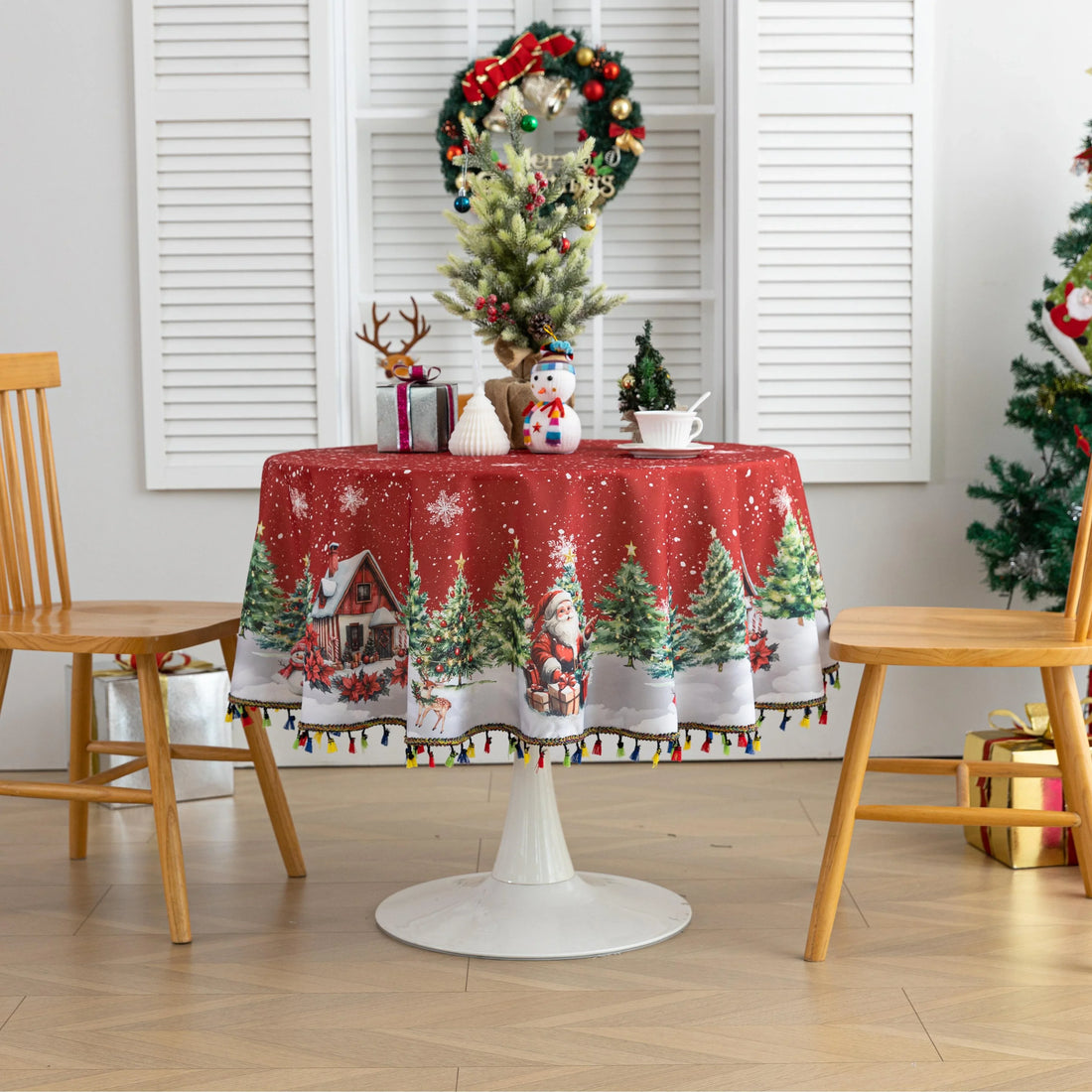 Christmas Santa Round Tablecloth – Bring festive cheer to your holiday table with this charming round tablecloth featuring a snowy winter scene of Santa Claus, Christmas trees, and a cozy cottage. Designed with a vibrant red background, falling snowflakes, and playful multicolor tassels, it creates a warm and joyful atmosphere for your celebrations. Perfect for Christmas dinners, holiday parties, or seasonal décor, this durable and decorative tablecloth adds a magical touch to any dining space.
