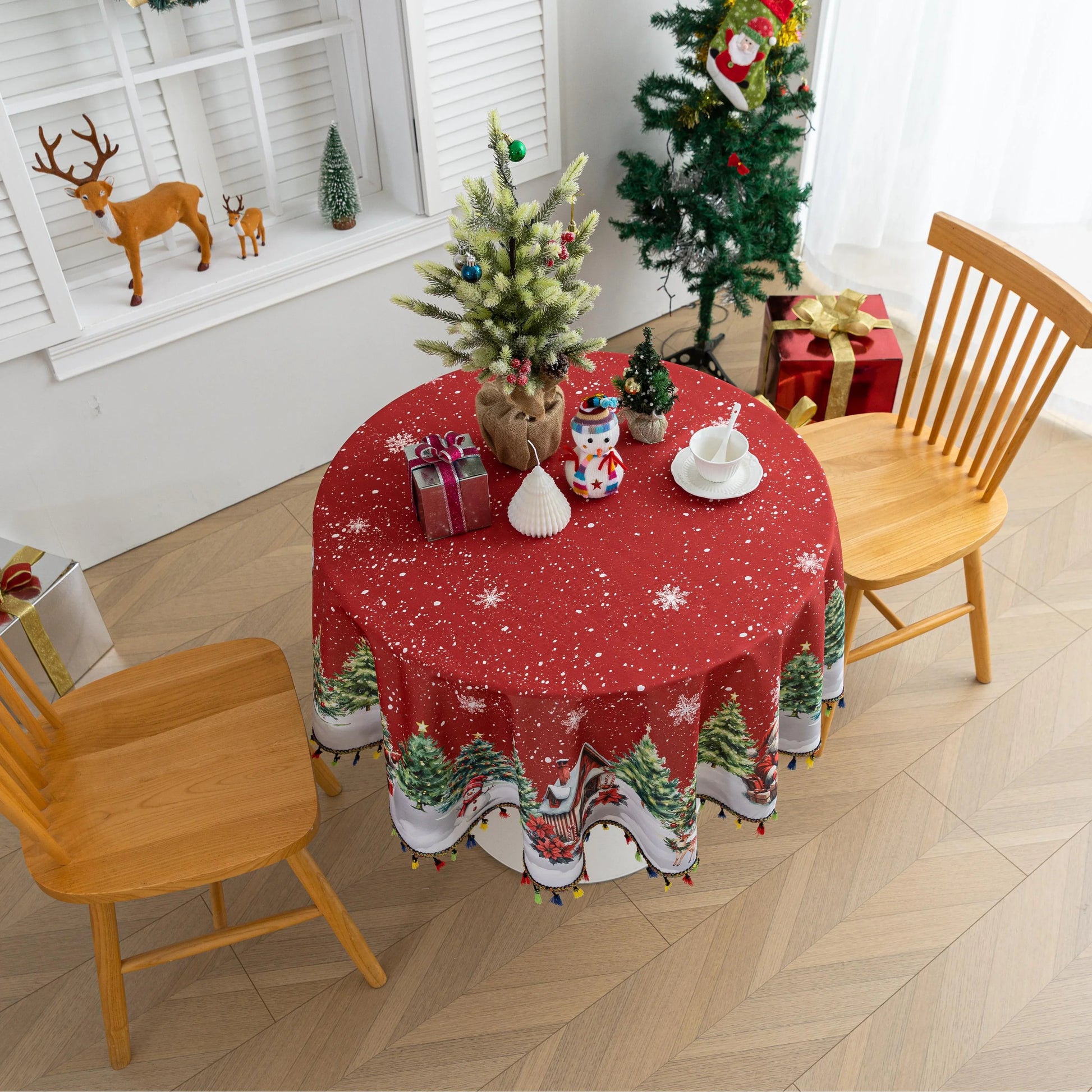 Christmas Santa Round Tablecloth – Bring festive cheer to your holiday table with this charming round tablecloth featuring a snowy winter scene of Santa Claus, Christmas trees, and a cozy cottage. Designed with a vibrant red background, falling snowflakes, and playful multicolor tassels, it creates a warm and joyful atmosphere for your celebrations. Perfect for Christmas dinners, holiday parties, or seasonal décor, this durable and decorative tablecloth adds a magical touch to any dining space.
