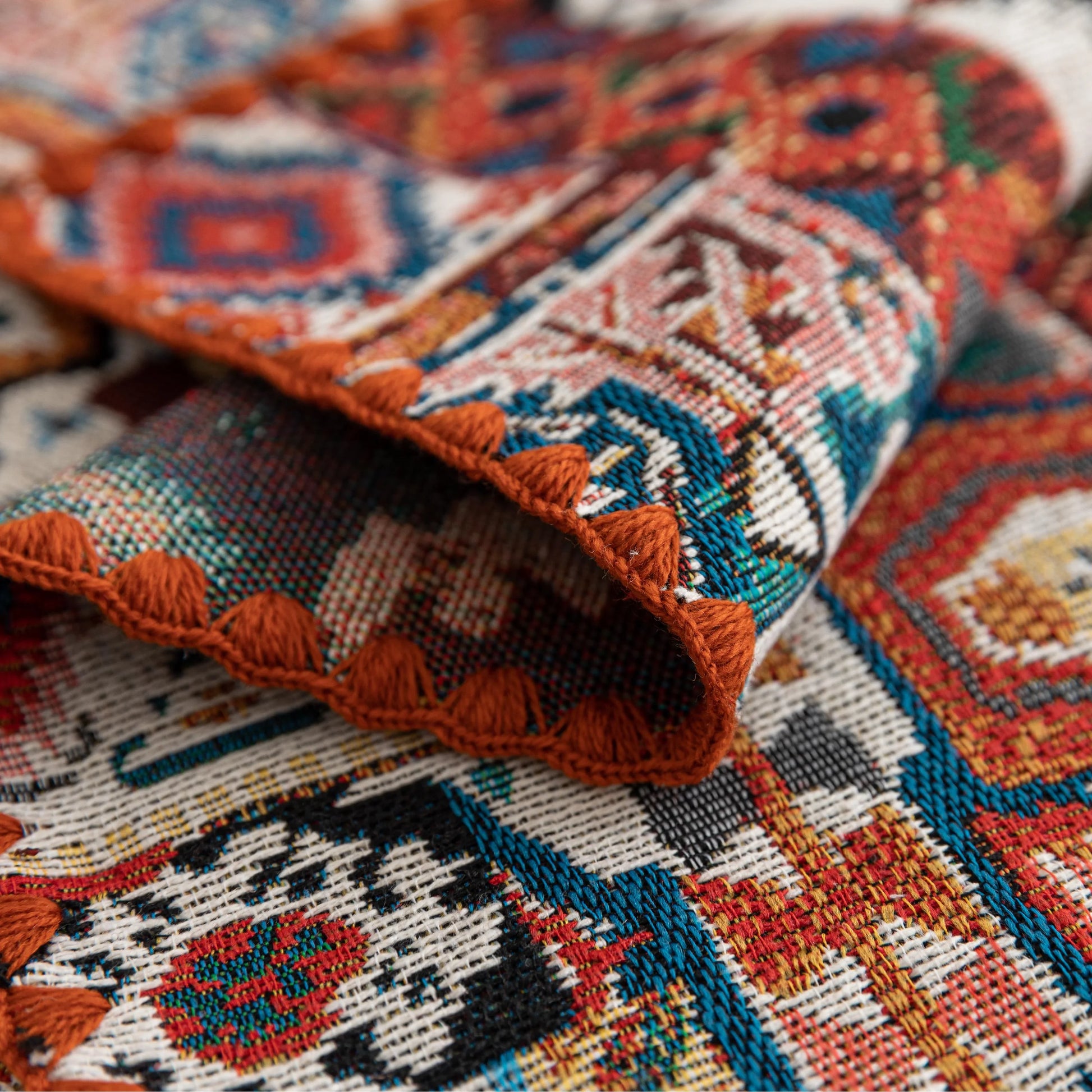 Bohemian woven placemat with vibrant geometric patterns, perfect for adding rustic charm and protecting your table during meals.