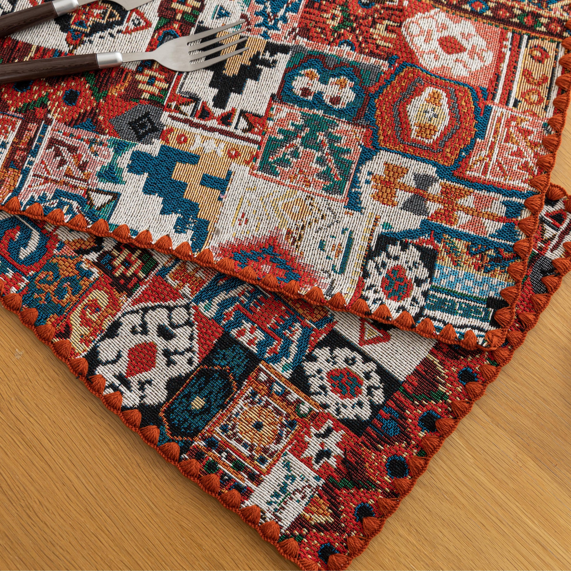 Bohemian woven placemat with vibrant geometric patterns, perfect for adding rustic charm and protecting your table during meals.