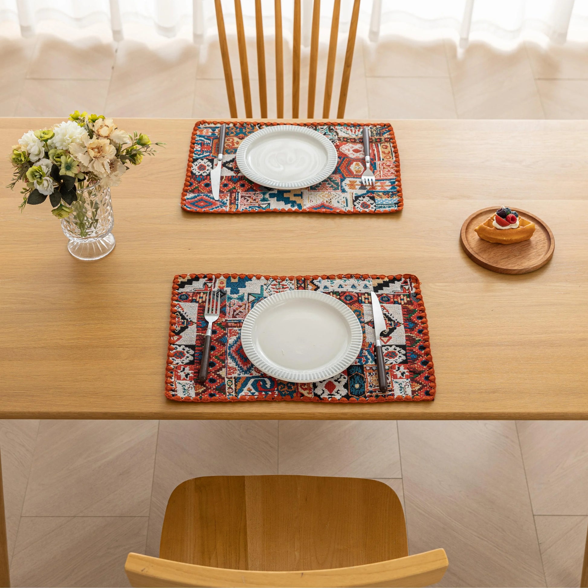 Bohemian woven placemat with vibrant geometric patterns, perfect for adding rustic charm and protecting your table during meals.
