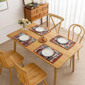 Bohemian woven placemat with vibrant geometric patterns, perfect for adding rustic charm and protecting your table during meals.