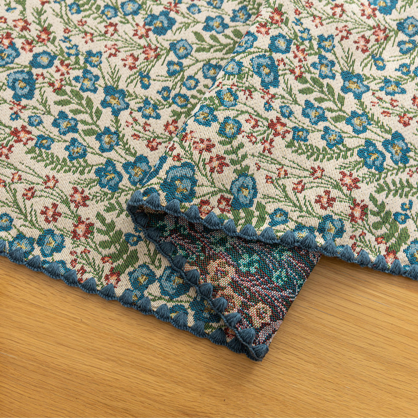 Vintage Floral Table Runner ¨C Bring a touch of timeless charm to your dining space with this beautifully woven table runner featuring delicate blue and red floral patterns on a soft cream background. Accented with a subtle blue border, it adds a fresh and inviting feel to any table setting. Perfect for everyday meals, afternoon tea, or special occasions, this durable and stylish runner complements farmhouse, cottage, and classic home d¨¦cor styles.
