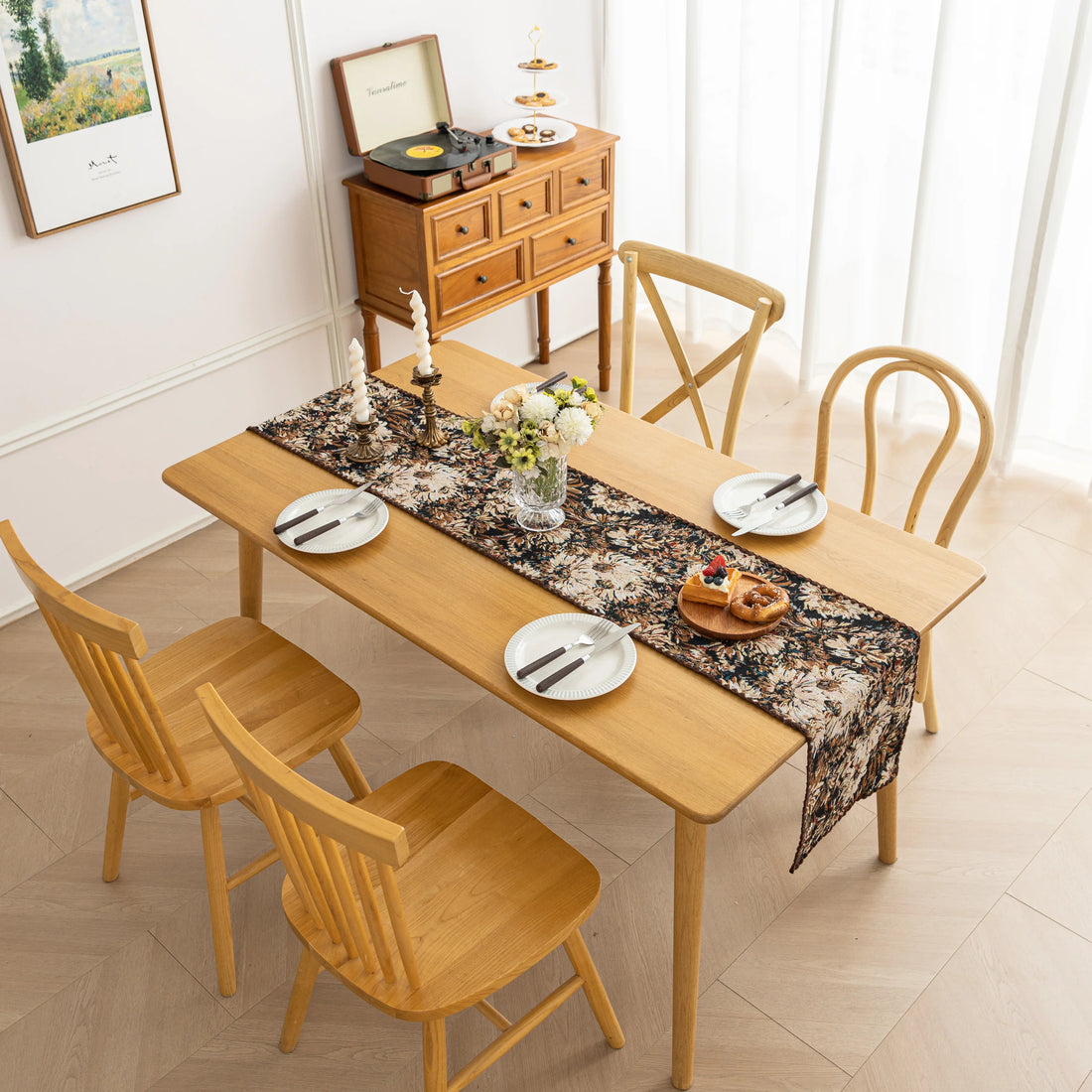 Elegant Floral Table Runner – Elevate your dining experience with this sophisticated table runner featuring an artistic floral pattern in rich, earthy tones. The dark background enhances the intricate botanical design, adding depth and elegance to your table setting. Perfect for formal dinners, festive gatherings, or everyday décor, this durable and stylish runner complements a variety of interior styles, from classic to modern.
