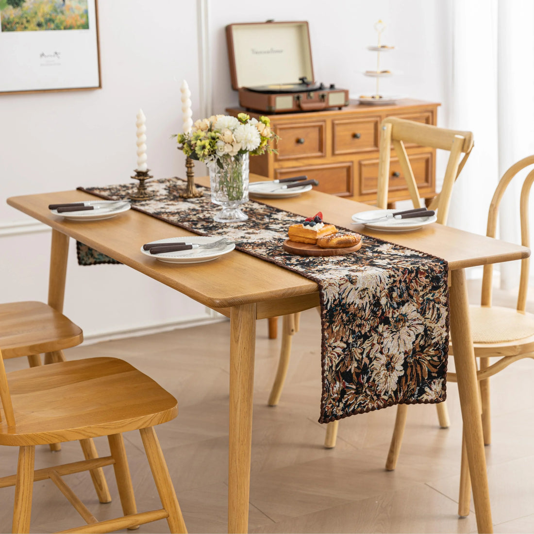 Elegant Floral Table Runner – Elevate your dining experience with this sophisticated table runner featuring an artistic floral pattern in rich, earthy tones. The dark background enhances the intricate botanical design, adding depth and elegance to your table setting. Perfect for formal dinners, festive gatherings, or everyday décor, this durable and stylish runner complements a variety of interior styles, from classic to modern.
