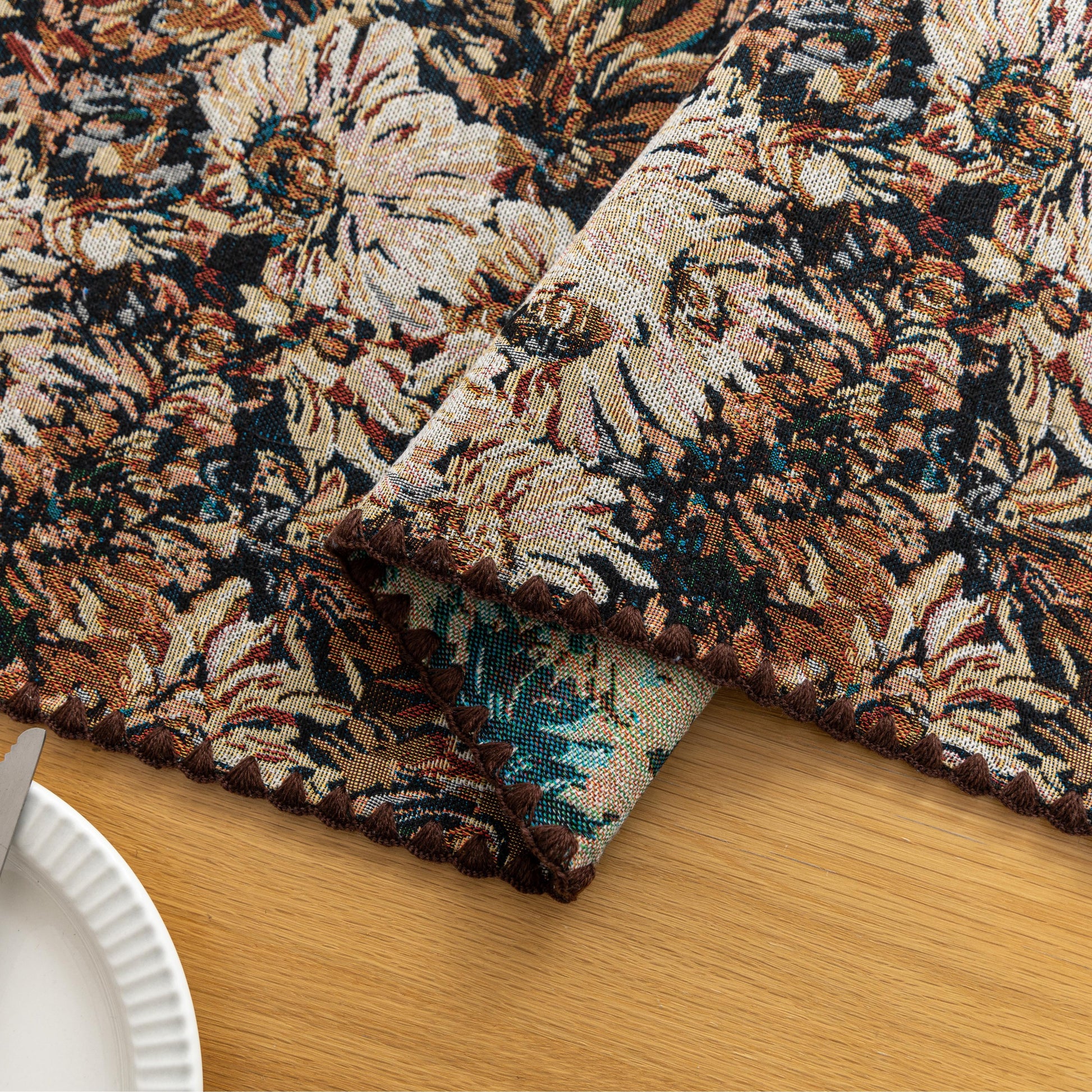 Elegant Floral Table Runner – Elevate your dining experience with this sophisticated table runner featuring an artistic floral pattern in rich, earthy tones. The dark background enhances the intricate botanical design, adding depth and elegance to your table setting. Perfect for formal dinners, festive gatherings, or everyday décor, this durable and stylish runner complements a variety of interior styles, from classic to modern.
