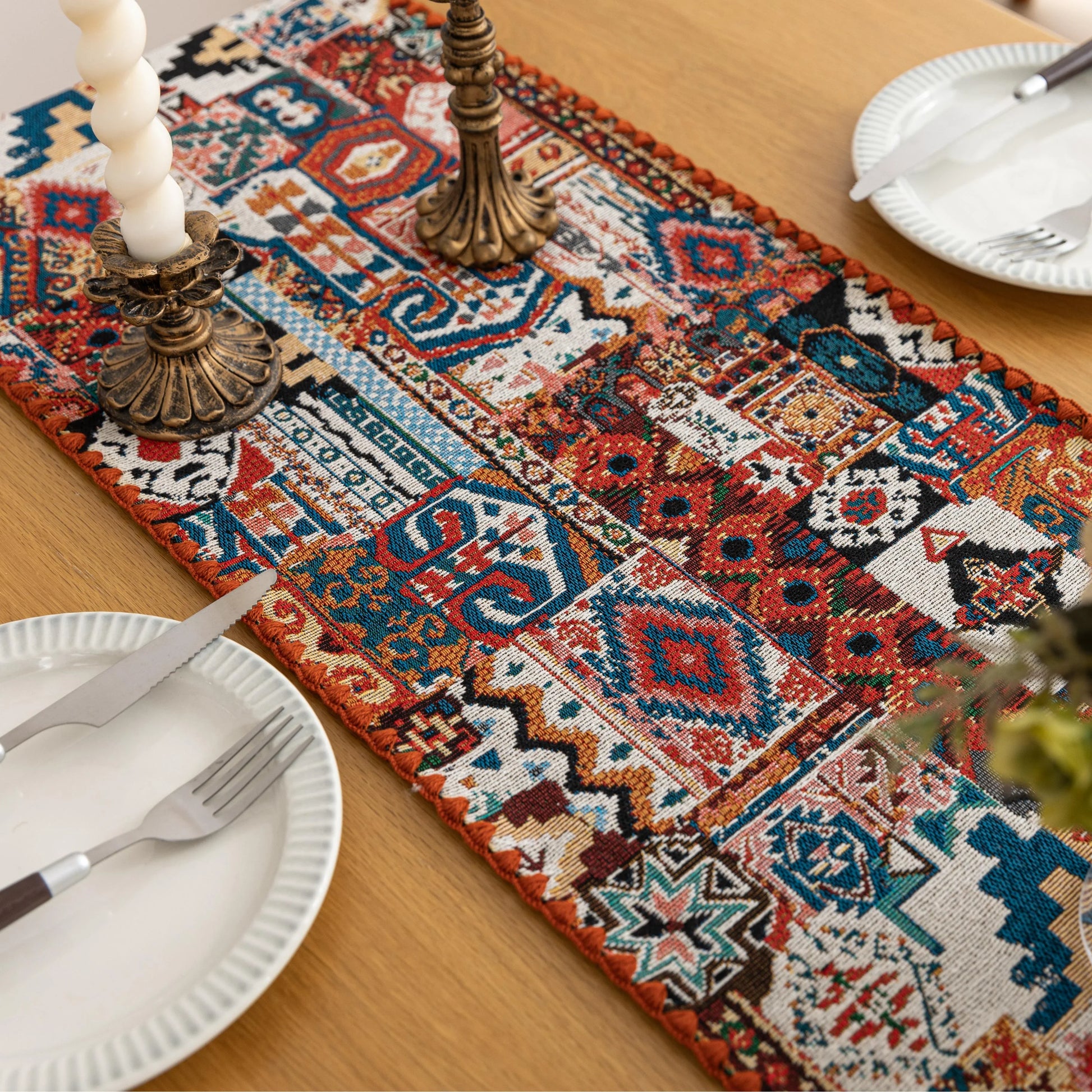 Colorful Bohemian Table Runner – Add a touch of vibrant charm to your dining table with this intricately patterned boho-style table runner. Featuring rich earthy tones, geometric motifs, and a woven texture, it’s perfect for elevating everyday meals or special gatherings. Ideal for coffee tables, dining settings, or sideboards, this decorative runner blends rustic warmth with artistic flair.
