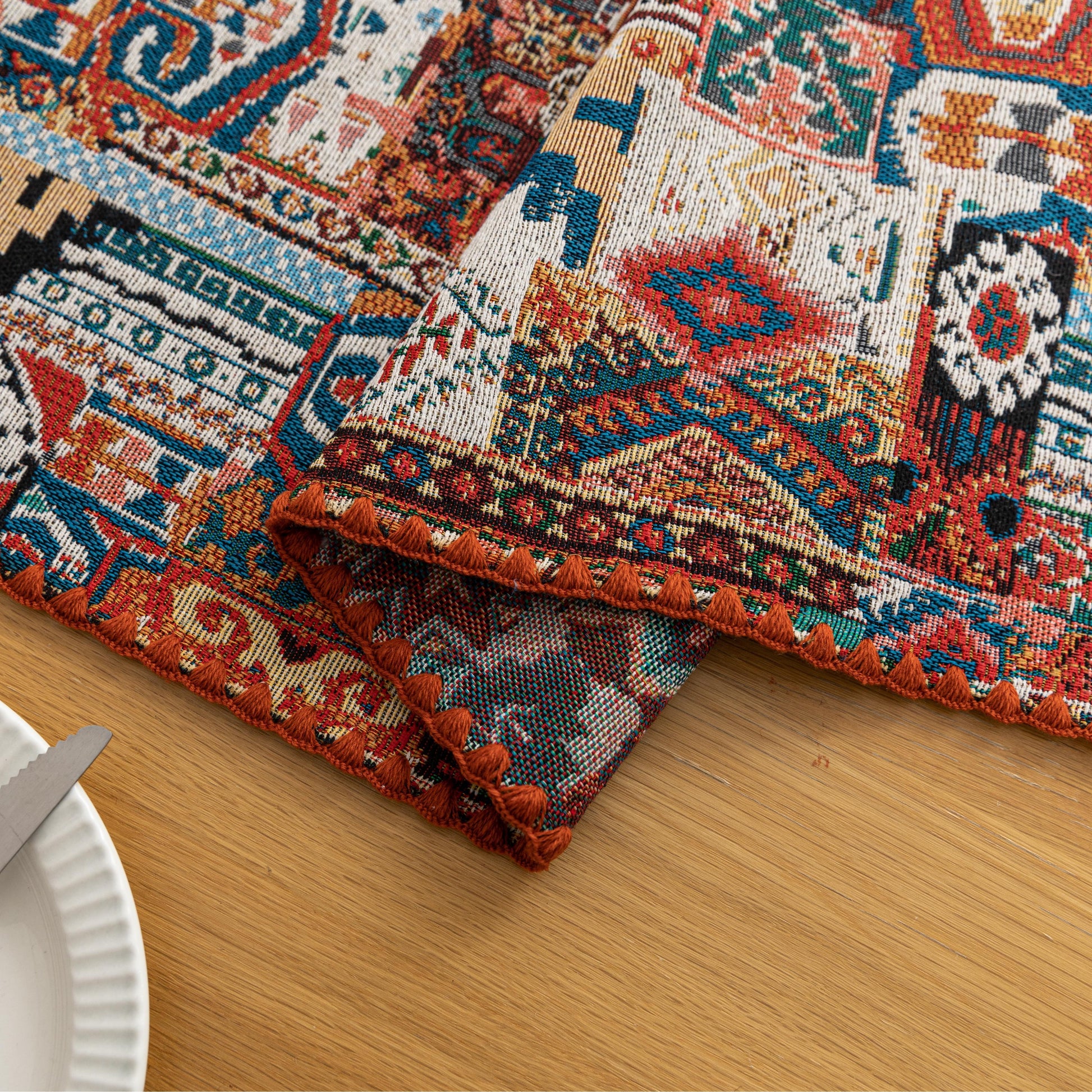 Colorful Bohemian Table Runner – Add a touch of vibrant charm to your dining table with this intricately patterned boho-style table runner. Featuring rich earthy tones, geometric motifs, and a woven texture, it’s perfect for elevating everyday meals or special gatherings. Ideal for coffee tables, dining settings, or sideboards, this decorative runner blends rustic warmth with artistic flair.