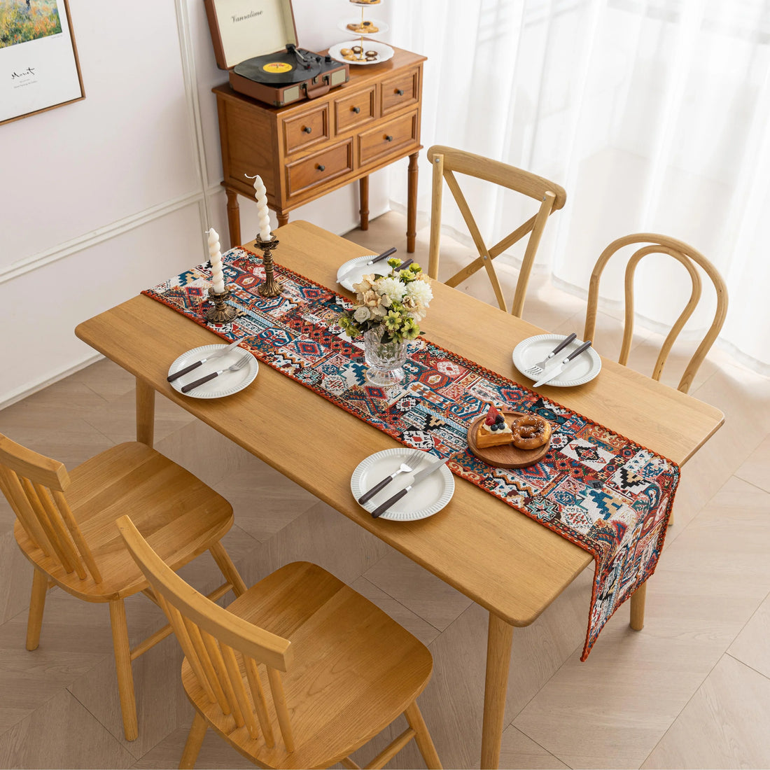 Colorful Bohemian Table Runner – Add a touch of vibrant charm to your dining table with this intricately patterned boho-style table runner. Featuring rich earthy tones, geometric motifs, and a woven texture, it’s perfect for elevating everyday meals or special gatherings. Ideal for coffee tables, dining settings, or sideboards, this decorative runner blends rustic warmth with artistic flair.
